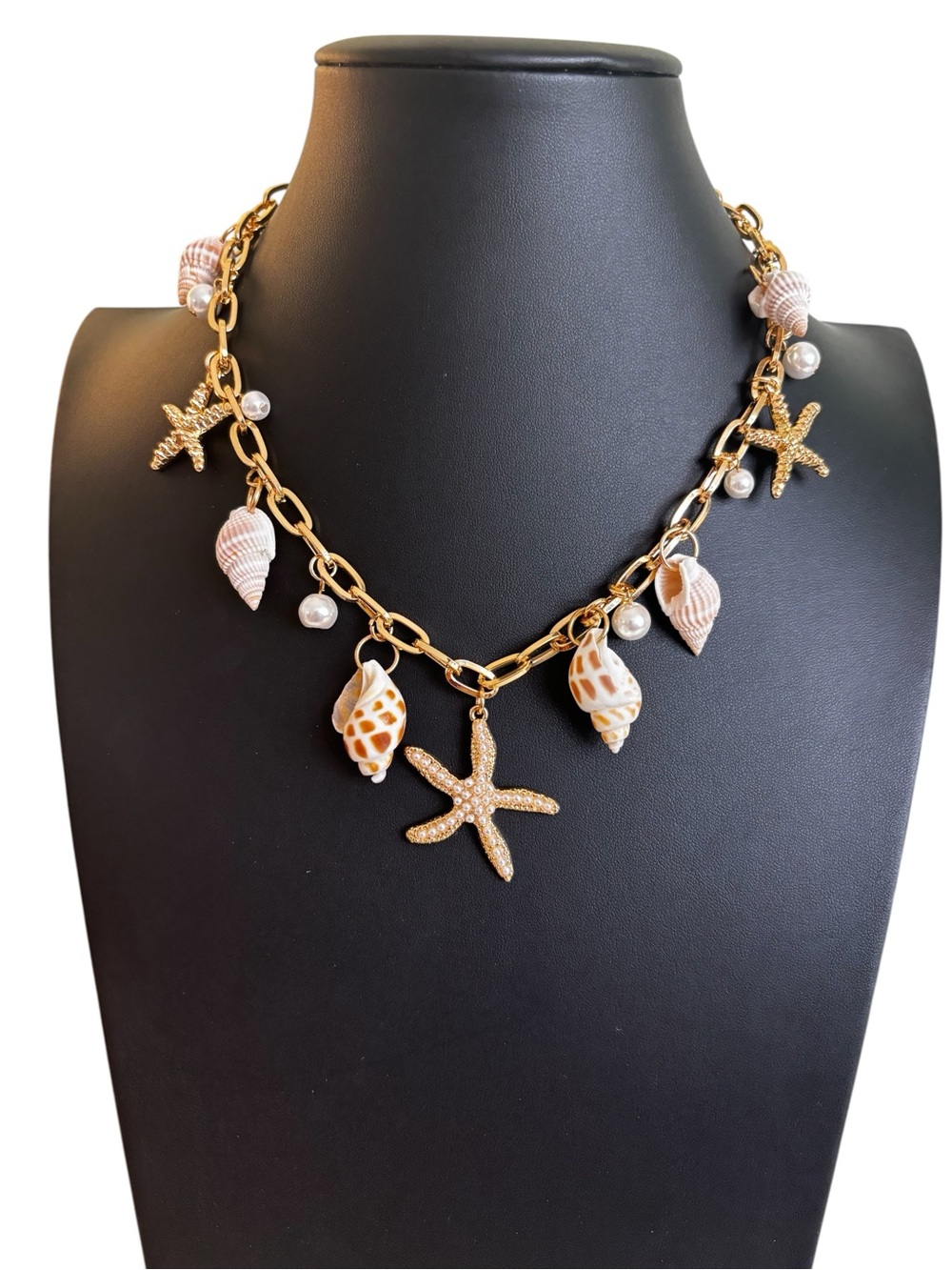 Beach Inspired Shell & Starfish Charm Necklace on Gold Tone Chain.